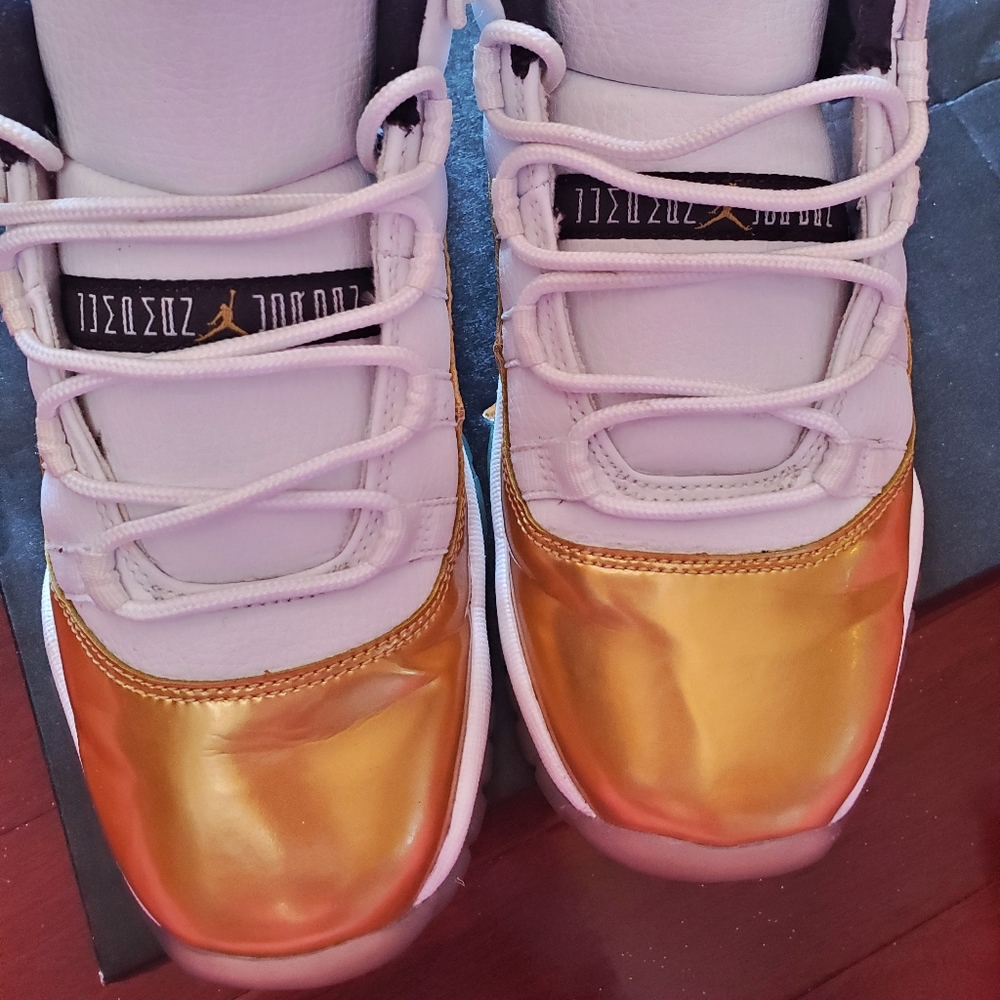 Golds Nike low tops
